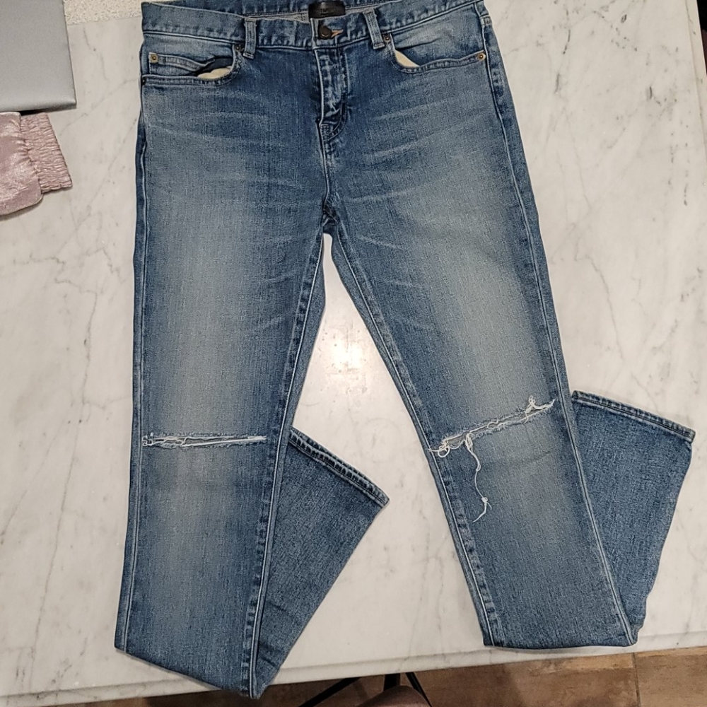SAINT LAURENT Distressed low-rise skinny jeans - Size 31
